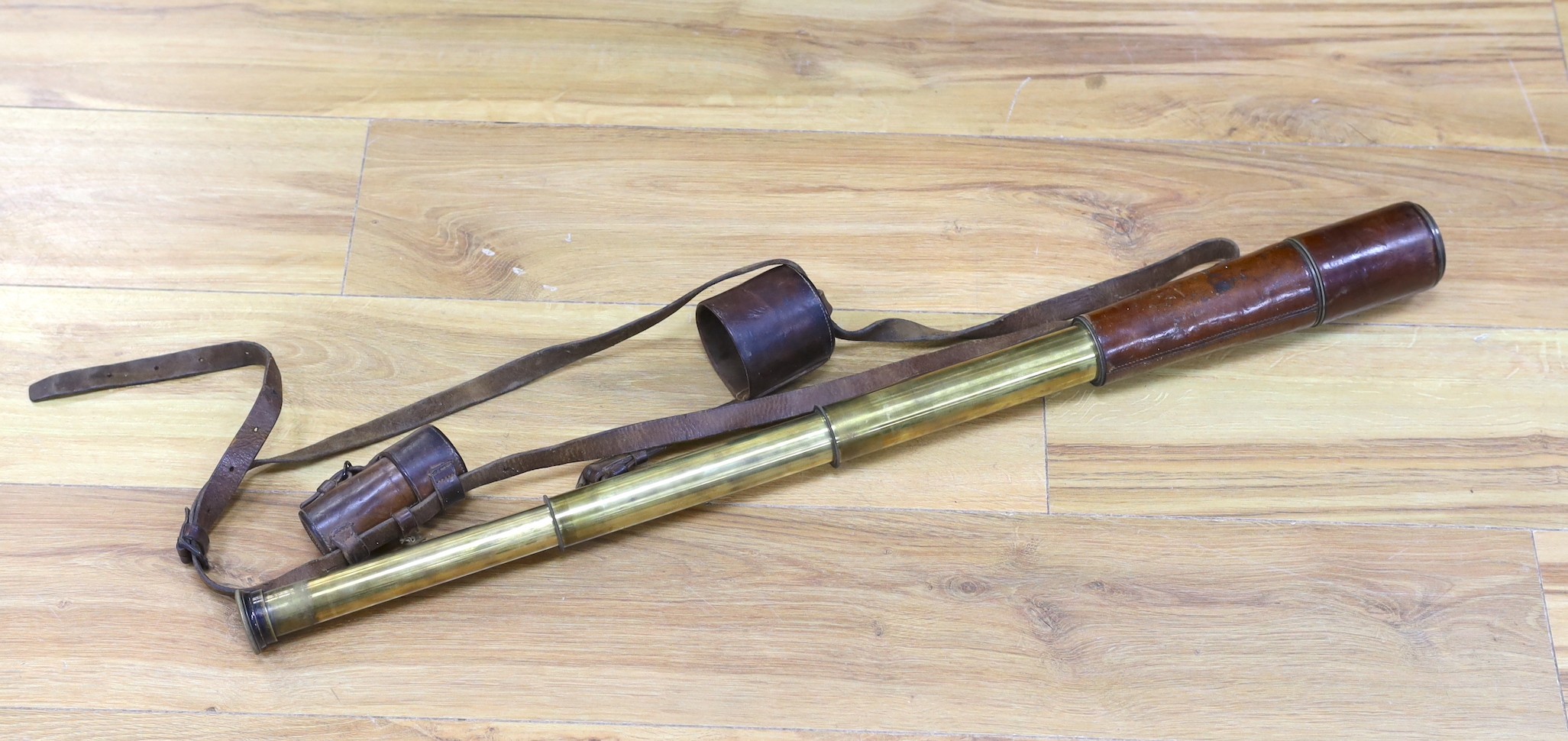 A WWI Ottway leather bound brass three draw telescope